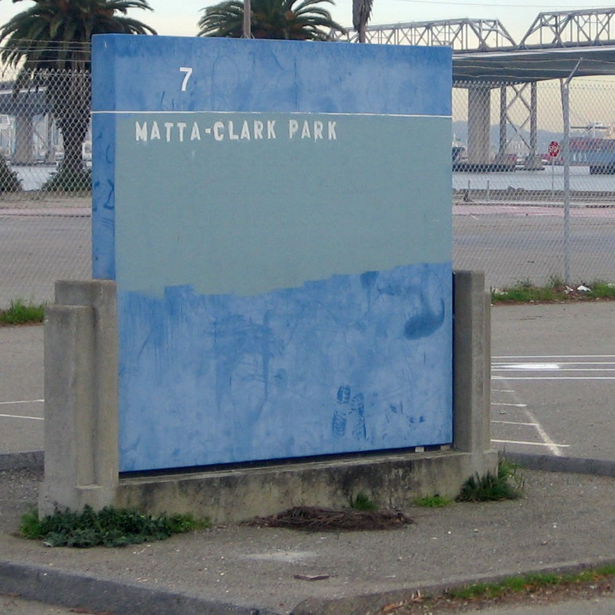 A sign altered to read "Matta-Clark Park" on Treasure Island as evidenced by the (old) Bay Bridge in the background.